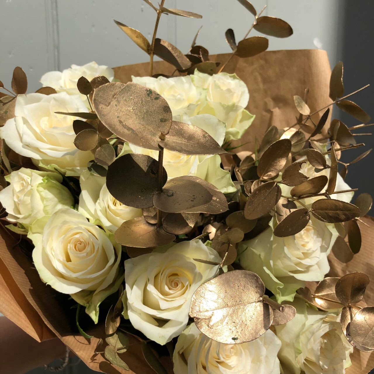Christmas bouquet with roses and eucalyptus